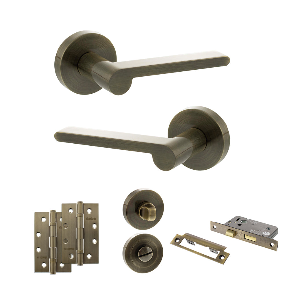 Quality image of Senza Pari Darrio Door Handle Pack (Bathroom Set - 3" CE Bathroom Lock, 4" Slim Knuckle Hinges x2) - Antique Brass | Sku. adpspro218ab13 | available from Trade Door Handles.
