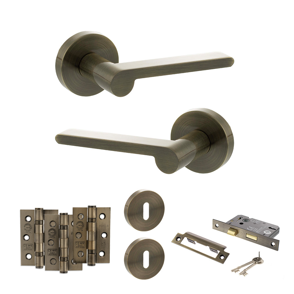 Quality image of Senza Pari Darrio Door Handle Pack (3 Lever Lock Set - 3" CE Sashlock, 3" Fire Rated Hinges x3) - Antique Brass | Sku. adpspro218ab15 | available from Trade Door Handles.