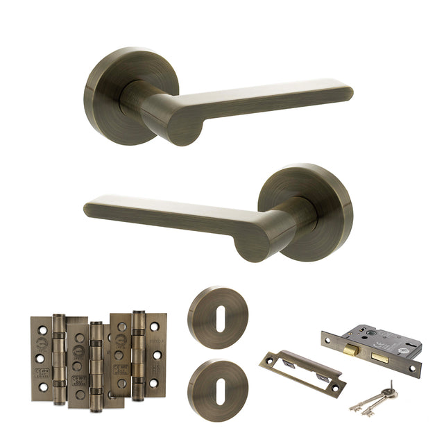 Quality image of Senza Pari Darrio Door Handle Pack (3 Lever Lock Set - 3" CE Sashlock, 3" Fire Rated Hinges x3) - Antique Brass | Sku. adpspro218ab15 | available from Trade Door Handles.