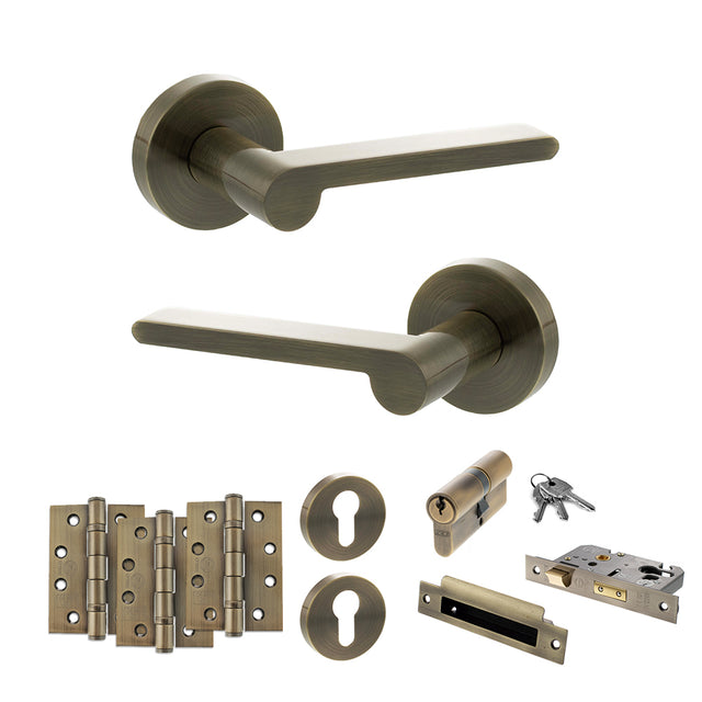 Quality image of Senza Pari Darrio Door Handle Pack (Euro Lock Set - 2.5" CE Sashlock, 4" Fire Rated Hinges x3) - Antique Brass | Sku. adpspro218ab22 | available from Trade Door Handles.