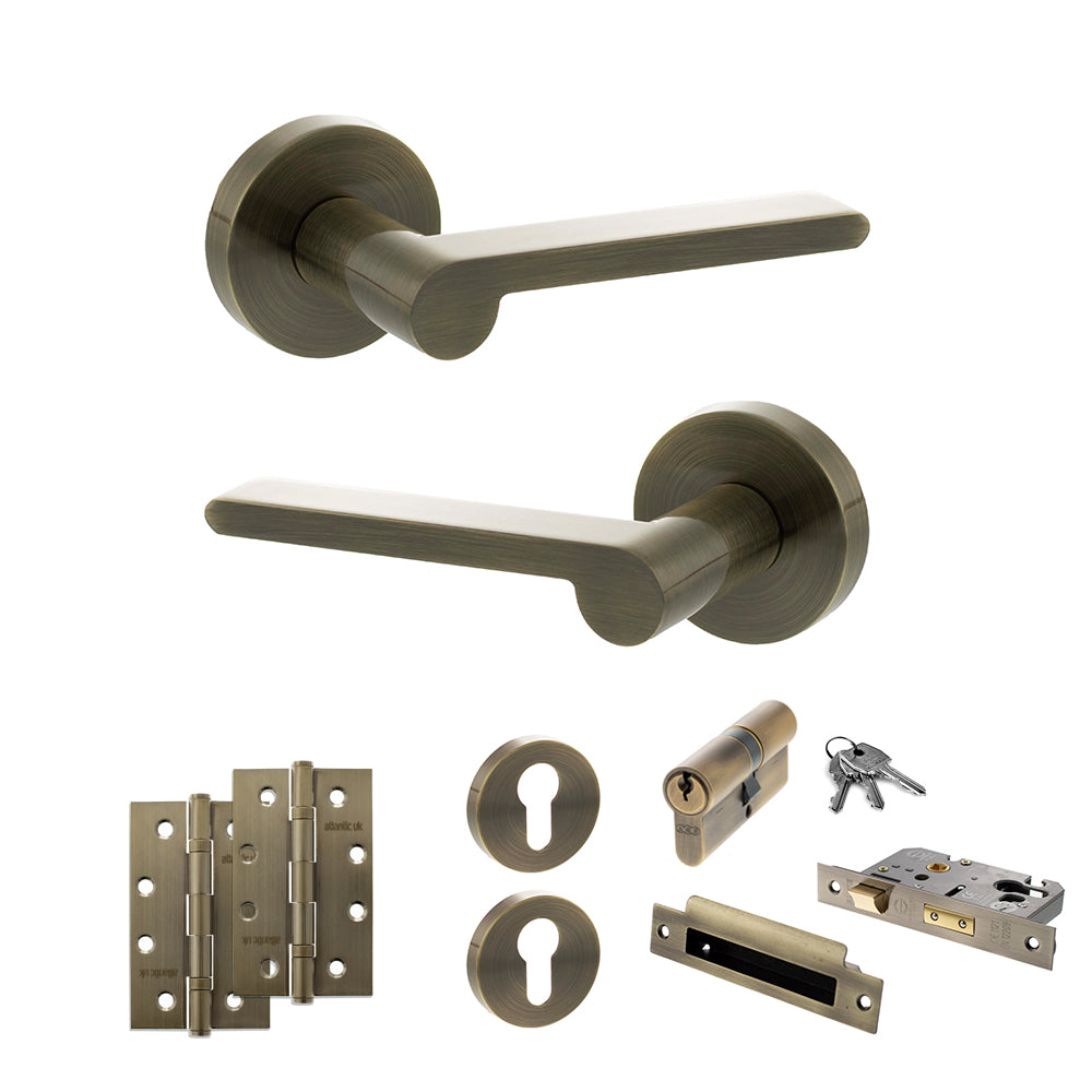 Quality image of Senza Pari Darrio Door Handle Pack (Euro Lock Set - 3" CE Sashlock, 4" Slim Knuckle Hinges x2) - Antique Brass | Sku. adpspro218ab25 | available from Trade Door Handles.