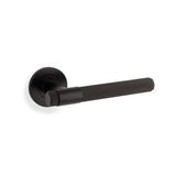 High quality image of Alexander & Wilks - Knurled Kingstone Lever on Round Rose - Black | Sku. aw240bl | Trade Door Handles.