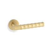 High quality image of Alexander & Wilks - Spitfire Bamboo Lever on Rose - Satin Brass PVD | Sku. aw225sbpvd | Trade Door Handles.