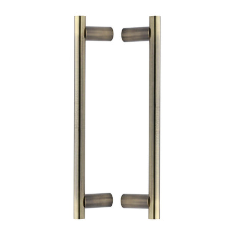 High quality image of the Heritage Brass Back to Back Door Pull Handle Round Bar Design 336mm Antique Brass Finish
 | Sku. btb2059-336-at | Discounted prices available from Trade Door Handles