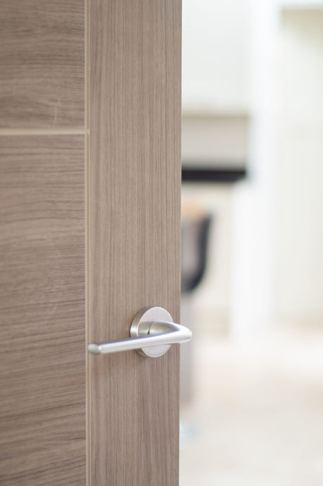 Quality image of CleanTouch Anti-Bac Forme Asti Lever Door Handle on Minimal Round Rose - Satin Chrome | Sku. ctfmr254sc | available from Trade Door Handles.