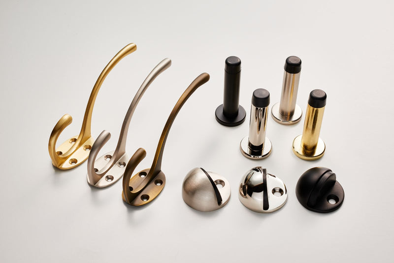 Carlisle Brass Accessories showing projecting door stops floor door stops hat and coat hooks