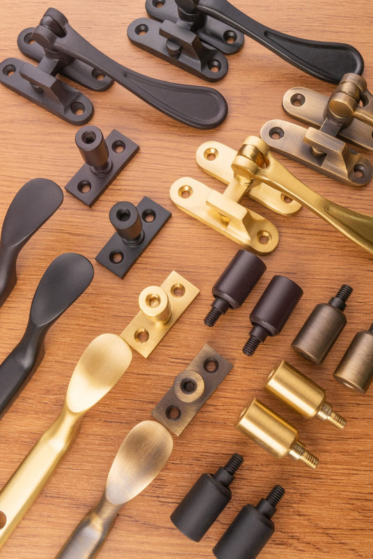 This is an image showing a range of Carlisle Brass Casement Window Hardware in various finishes
