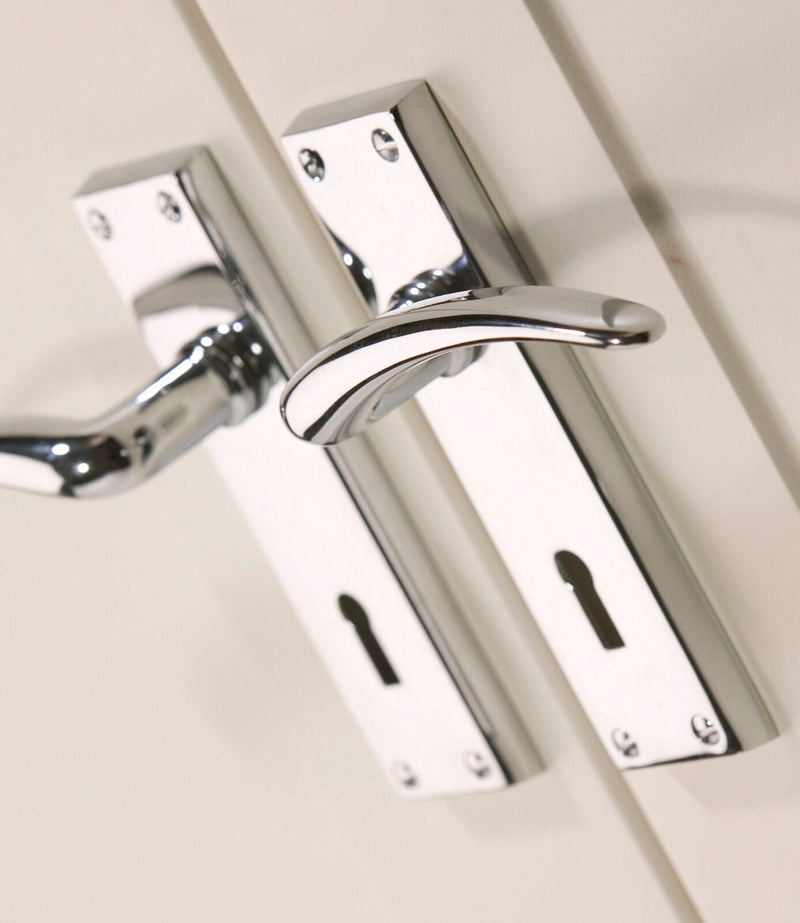 Carlisle Brass DL64 door handles on backplates Polished Chrome