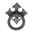 High quality image of the M.Marcus Fleur-De-Lys Cabinet Ring Drop Pull Matt Black Rustic Iron | Sku. fb6331 | Discounted prices available from Trade Door Handles
