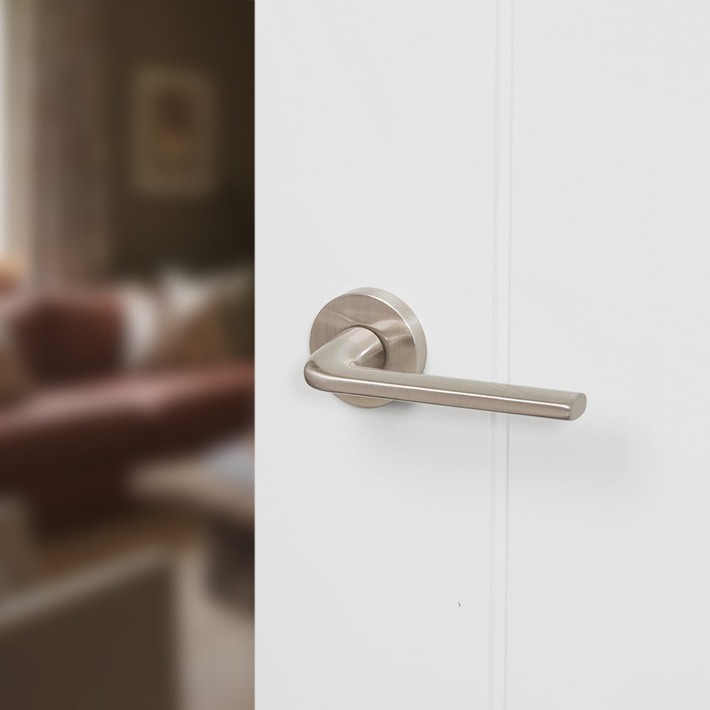 Quality image of Forme Milly Lever Door Handle on Minimal Round Rose - Satin Nickel | Sku. fmr133sn | available from Trade Door Handles.