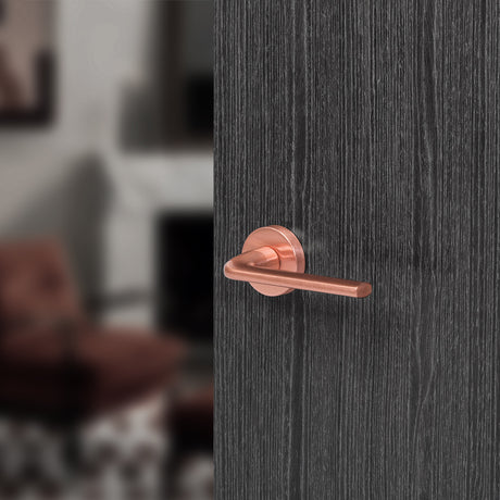 Quality image of Forme Milly Lever Door Handle on Minimal Round Rose - Urban Satin Copper | Sku. fmr133usc | available from Trade Door Handles.
