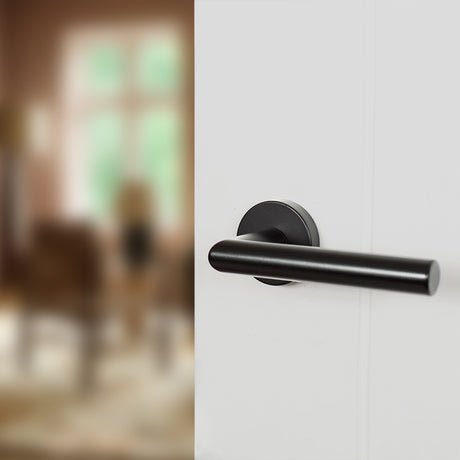 Quality image of Forme Elle Lever Door Handle on Minimal Round Rose - Matt Black | Sku. fmr236mb | available from Trade Door Handles.