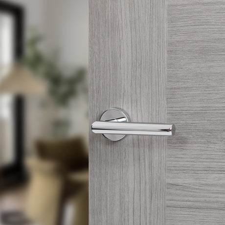 Quality image of Forme Elle Lever Door Handle on Minimal Round Rose - Polished Chrome | Sku. fmr236pc | available from Trade Door Handles.