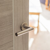 Quality image of Forme Elle Lever Door Handle on Minimal Round Rose - Satin Nickel | Sku. fmr236sn | available from Trade Door Handles.