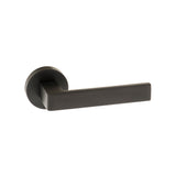 Quality image of Forme Asti Lever Door Handle on Minimal Round Rose - Matt Black | Sku. fmr254mb | available from Trade Door Handles.