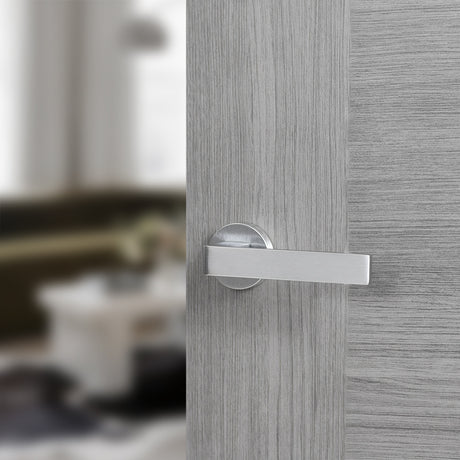 Quality image of Forme Asti Lever Door Handle on Minimal Round Rose - Satin Chrome | Sku. fmr254sc | available from Trade Door Handles.