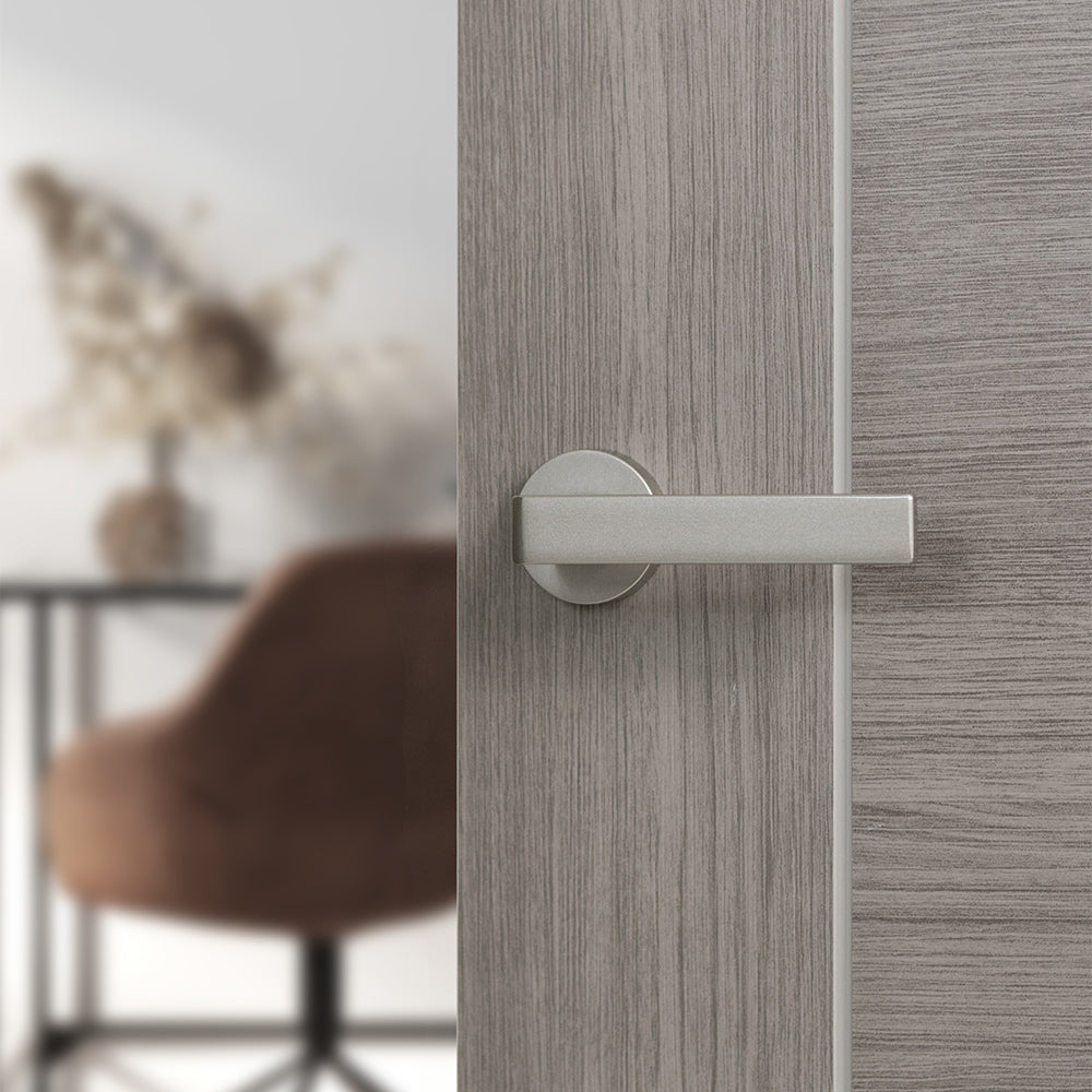Quality image of Forme Asti Lever Door Handle on Minimal Round Rose - Satin Nickel | Sku. fmr254sn | available from Trade Door Handles.