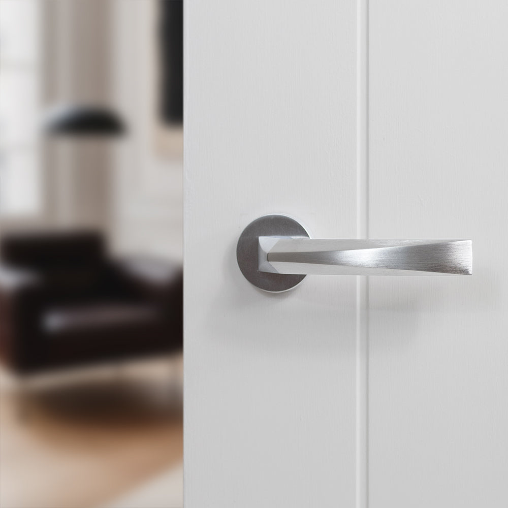 Quality image of Forme Crystal Lever Door Handle on Minimal Round Rose - Satin Chrome | Sku. fmr268sc | available from Trade Door Handles.