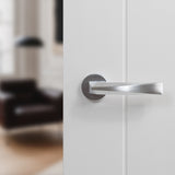 Quality image of Forme Crystal Lever Door Handle on Minimal Round Rose - Satin Chrome | Sku. fmr268sc | available from Trade Door Handles.