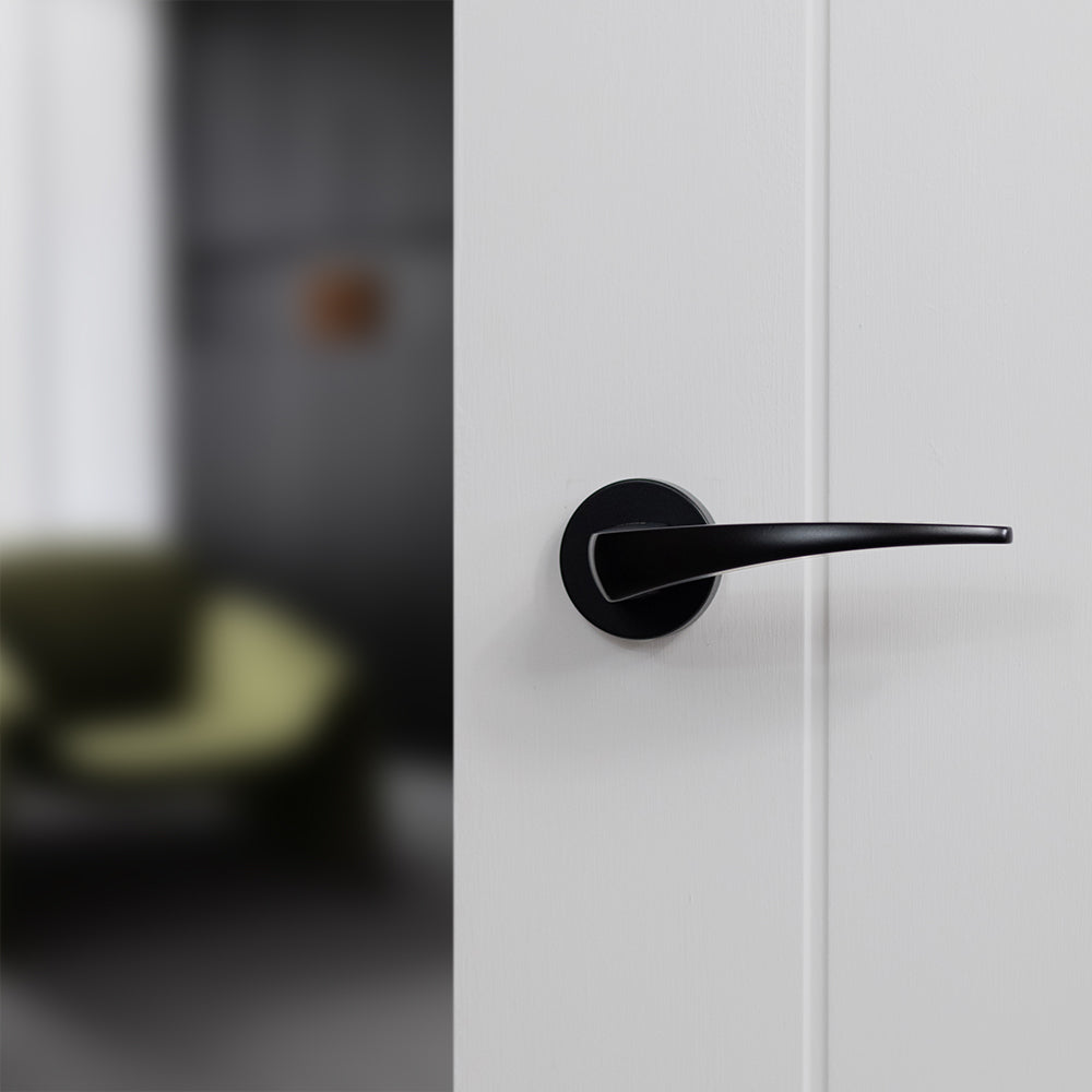 Quality image of Forme Foglia Lever Door Handle on Minimal Round Rose - Matt Black | Sku. fmr272mb | available from Trade Door Handles.