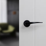 Quality image of Forme Foglia Lever Door Handle on Minimal Round Rose - Matt Black | Sku. fmr272mb | available from Trade Door Handles.