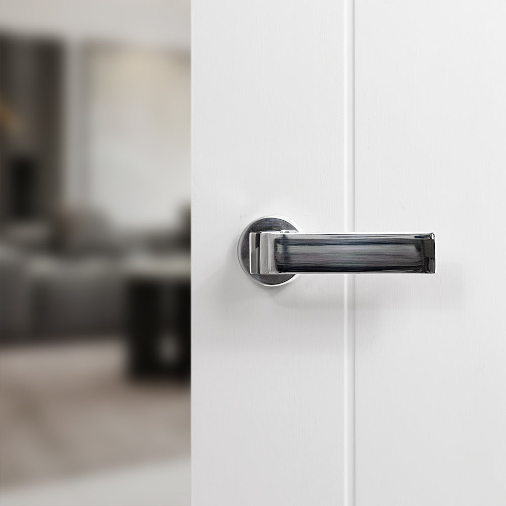 Quality image of Forme Monza Lever Door Handle on Minimal Round Rose - Polished Chrome | Sku. fmr413pc | available from Trade Door Handles.