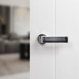 Quality image of Forme Monza Lever Door Handle on Minimal Round Rose - Polished Chrome | Sku. fmr413pc | available from Trade Door Handles.
