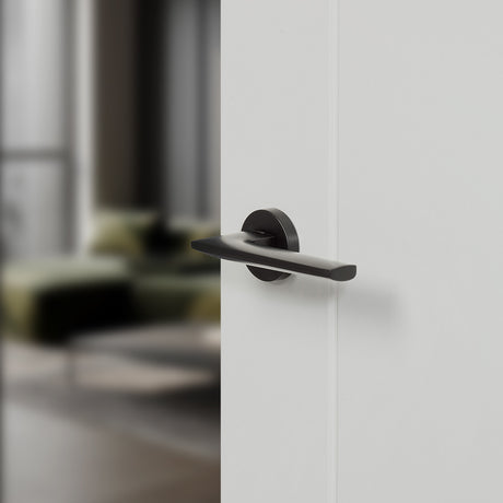 Quality image of Forme Boston Lever Door Handle on Minimal Round Rose - Matt Black | Sku. fmr422mb | available from Trade Door Handles.
