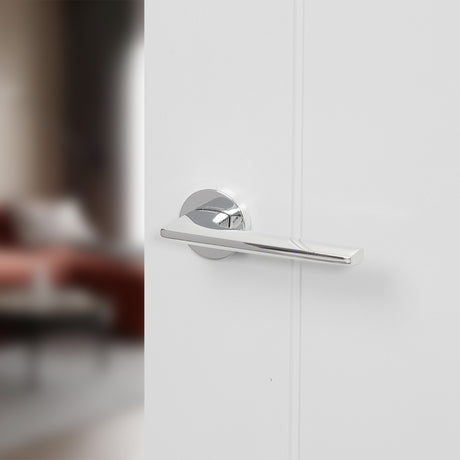 Quality image of Forme Boston Lever Door Handle on Minimal Round Rose - Polished Chrome | Sku. fmr422pc | available from Trade Door Handles.