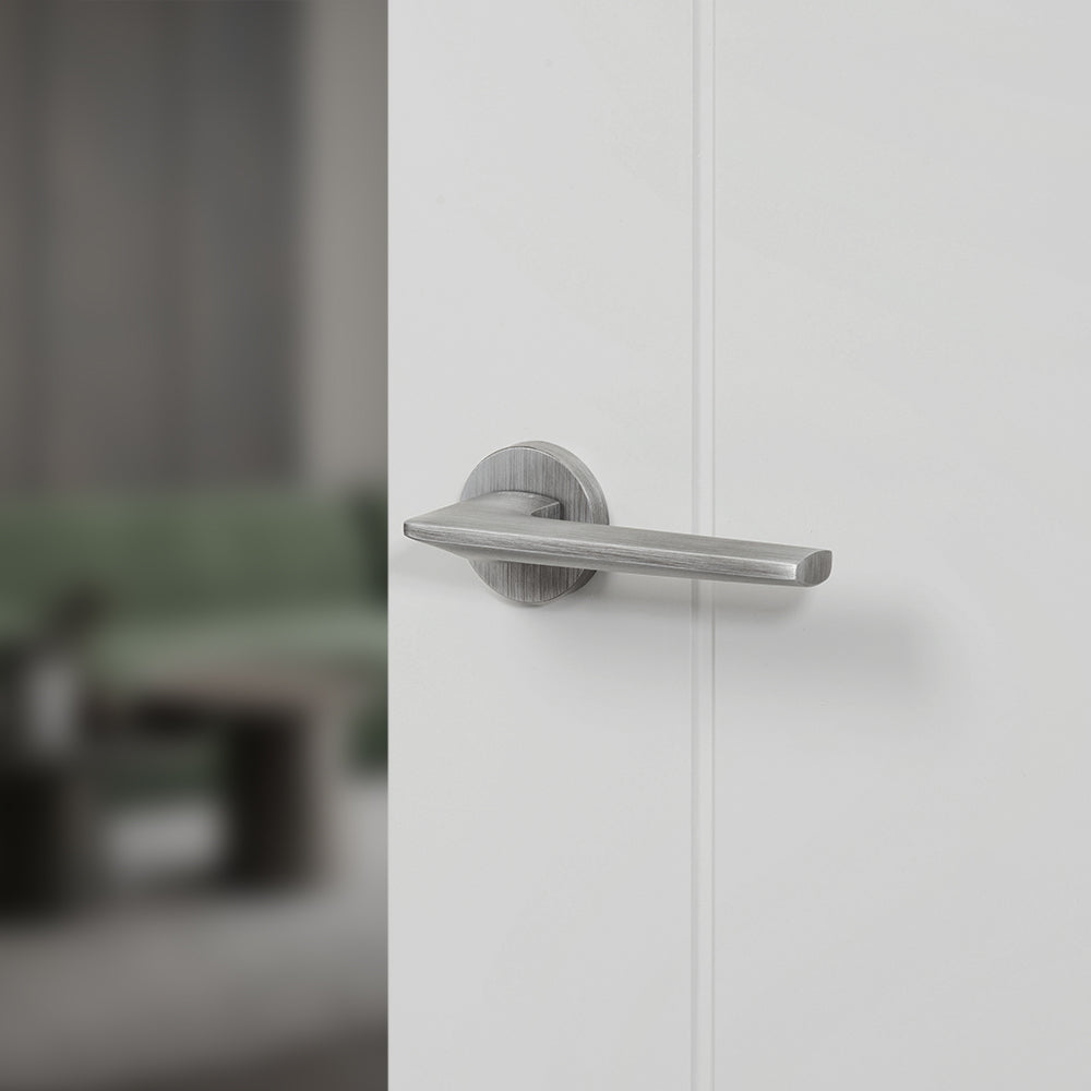 Quality image of Forme Boston Lever Door Handle on Minimal Round Rose - Urban Graphite | Sku. fmr422ug | available from Trade Door Handles.