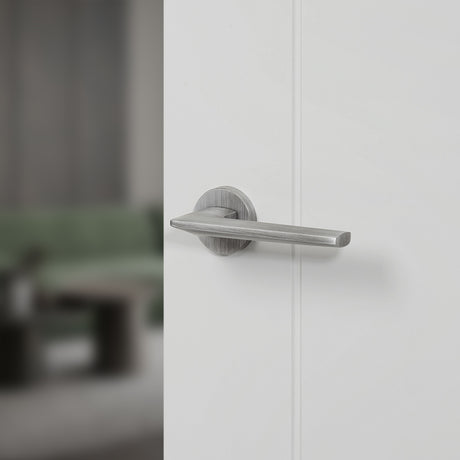 Quality image of Forme Boston Lever Door Handle on Minimal Round Rose - Urban Graphite | Sku. fmr422ug | available from Trade Door Handles.