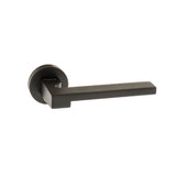 Quality image of Forme Ginevra Lever Door Handle on Minimal Round Rose - Matt Black | Sku. fmr430mb | available from Trade Door Handles.