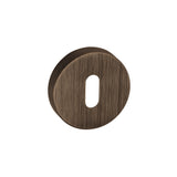 Quality image of Forme Key Escutcheons on Minimal Round Rose - Urban Bronze | Sku. fmrkub | available from Trade Door Handles.