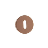 Quality image of Forme Key Escutcheons on Minimal Round Rose - Urban Satin Copper | Sku. fmrkusc | available from Trade Door Handles.