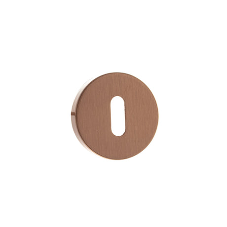 Quality image of Forme Key Escutcheons on Minimal Round Rose - Urban Satin Copper | Sku. fmrkusc | available from Trade Door Handles.