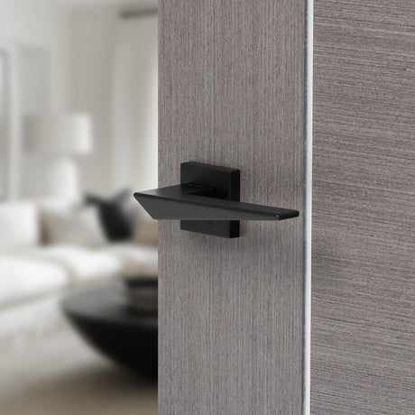 Quality image of Forme Naxos Lever Door Handle on Minimal Square Rose - Matt Black | Sku. fms215mb | available from Trade Door Handles.