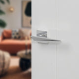 Quality image of Forme Naxos Lever Door Handle on Minimal Square Rose - Polished Chrome | Sku. fms215pc | available from Trade Door Handles.