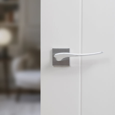 Quality image of Forme Olimpia Lever Door Handle on Minimal Square Rose - Satin Chrome | Sku. fms280sc | available from Trade Door Handles.