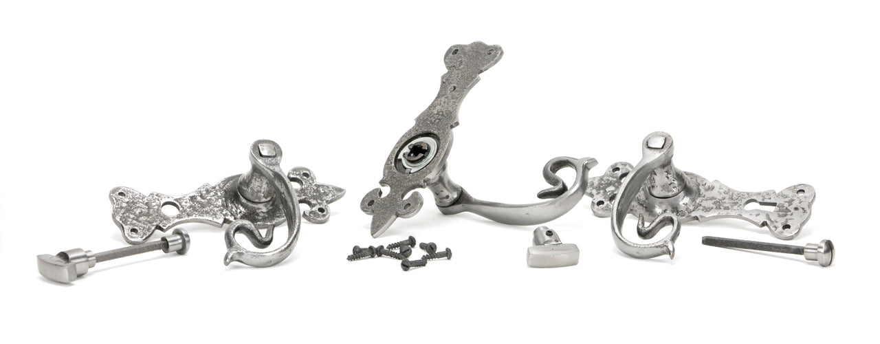 Image showing a range of From The Anvil Natural Textured door furniture.  Available to order from Trade Door Handles in Kendal