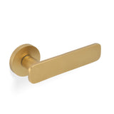 High quality image of Valli Giasone Lever on Round Rosette - Satin Brass PVD| Sku. H1050SBPVD |Trade Door Handles.