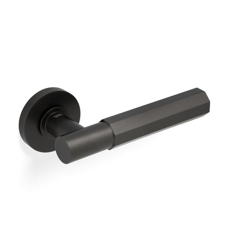High quality image of Valli Antonio Citterio Lever on Round Rosette (Esagono) - Dark Bronze PVD| Sku. H380EDPVD |Trade Door Handles.