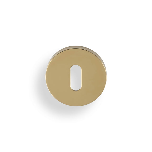High quality image of Valli Lock Profile Push-on Round Rosette Escutcheon - Polished Brass PVD| Sku. K1103PBPVD |Trade Door Handles.
