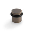 High quality image of Valli 38 x 35mm - Floor Mounted Plain Doorstop - Concealed Fix - Antique Brass| Sku. K1300AB |Trade Door Handles.