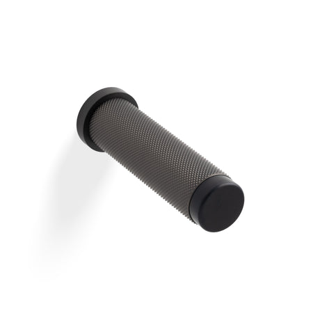 High quality image of Valli 76 x 20mm - Wall Mounted Knurled Doorstop on Rose - Concealed Fix - Dark Bronze PVD| Sku. K1401EDPVD |Trade Door Handles.