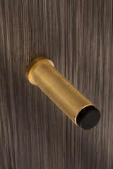 Valli 76 x 20mm - Wall Mounted Knurled Doorstop on Rose - Concealed Fix - Satin Brass PVD