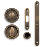 High quality image of Valli Radius Sliding Door Set - Antique Brass| Sku. K1500AB |Trade Door Handles.