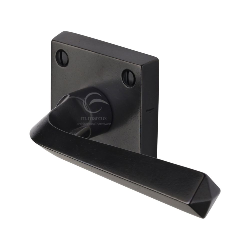 High quality image of M.Marcus - Rustic Dark Bronze Door Handle Lever Latch on Square Rose Donnington Design | Sku. rdb1953 | available from Trade Door Handles.