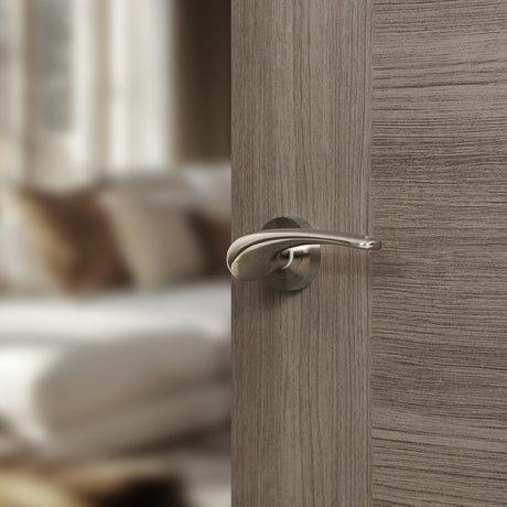 Quality image of Mediterranean Marseille Lever Door Handle on Round Rose - Satin Nickel | Sku. m70sn | available from Trade Door Handles.