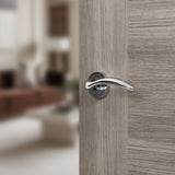 Quality image of Mediterranean Ancon Lever Door Handle on Round Rose - Polished Chrome | Sku. m77cp | available from Trade Door Handles.