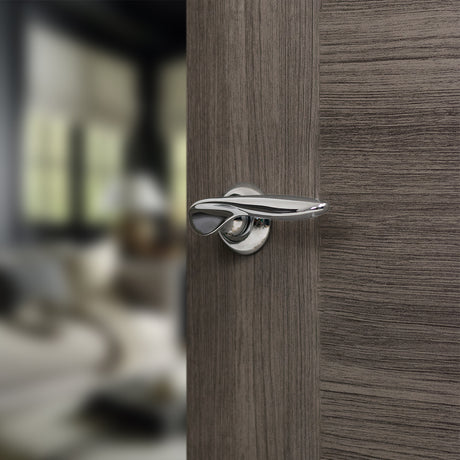 Quality image of Mediterranean Malta Lever Door Handle on Round "C" Rose - Polished Chrome | Sku. mc25cp | available from Trade Door Handles.